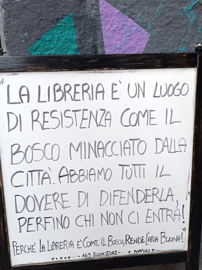 Amplifying Women’s Voices: In a small alley in Naples, I found a book-sharing box and a sign outside a bookshop that read: "The bookshop is a place of resistance, like a forest threatened by the city. We all have a duty to defend it, even those who never enter, because the bookshop, like the forest, makes the air better."